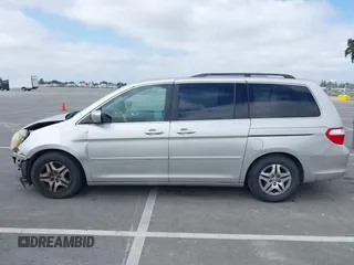 2005 Honda Odyssey EX-L with VIN 5FNRL38745B075486, listed as a IAAI auction lot 42080772 with 197,158 mi miles and . Bid and sale history available at DreamBid. Image 14.