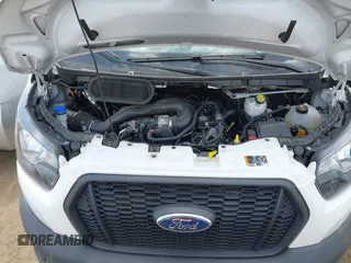 2024 Ford Transit Cargo with VIN 1FTBR1Y89RKA01132, listed as a IAAI auction lot 42668811 with 31,666 mi miles and . Bid and sale history available at DreamBid. Image 10.