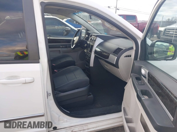 2010 Dodge Grand Caravan SXT with VIN 2D4RN5D17AR444818, listed as a IAAI auction lot 40941591 with Not Provided miles and . Bid and sale history available at DreamBid. Image 5.