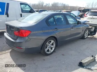 2014 BMW 3 Series 328i xDrive with VIN WBA3B3G5XENR83156, listed as a IAAI auction lot 41803982 with 111,318 mi miles. Bid and sale history available at carsss.com. Image 4.