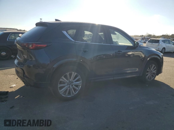 2023 Mazda CX-5 Signature with VIN JM3KFBXYXP0130139, listed as a Copart auction lot 88321445 with 22,911 mi miles and Salvage Title. Bid and sale history available at carsss.com. Image 3.
