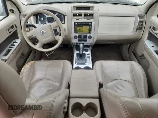 2009 Mercury Mariner Hybrid with VIN 4M2CU29369KJ14719, listed as a Copart auction lot 62511705 with 144,062 mi miles and Salvage title. Bid and sale history available at DreamBid. Image 8.