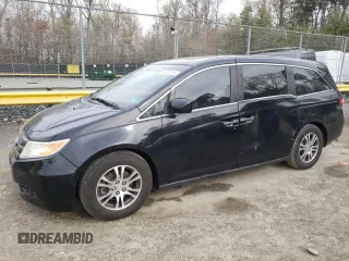 2012 Honda Odyssey EX-L with VIN 5FNRL5H67CB025164, listed as a Copart auction lot 51873715 with 110,260 mi miles and Salvage Title. Bid and sale history available at carsss.com. Image 1.