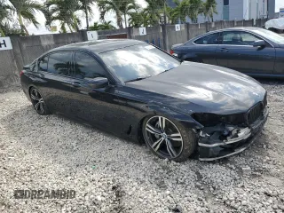 2017 BMW 7 Series 740i with VIN WBA7E2C34HG741026, listed as a Copart auction lot 52792995 with 91,462 mi miles and Salvage Title. Bid and sale history available at carsss.com. Image 4.