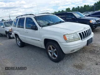2002 Jeep Grand Cherokee Limited with VIN 1J8GW58J22C115460, listed as a IAAI auction lot 42291615 with 197,132 mi miles and . Bid and sale history available at DreamBid. Image 1.