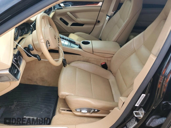2015 Porsche Panamera S E-Hybrid z VIN WP0AD2A76FL041627, wystawiony jako Copart lot #63190924 z przebiegiem 88 860 mil mil oraz Szkody całkowita. Historia ofert i sprzedaży dostępna na DreamBid. Obrazek 7.