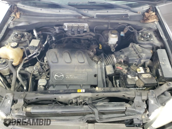 2005 Mazda Tribute S with VIN 4F2CZ96115KM59847, listed as a Copart auction lot 67740144 with 217,053 mi miles and Salvage Title. Bid and sale history available at carsss.com. Image 12.