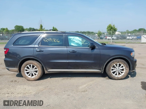 2015 Dodge Durango SXT with VIN 1C4RDHAG7FC869904, listed as a IAAI auction lot 42491906 with 120,396 mi miles and . Bid and sale history available at DreamBid. Image 13.