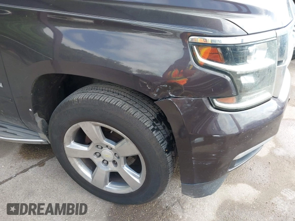 2015 Chevrolet Suburban LTZ with VIN 1GNSCKKC7FR272138, listed as a IAAI auction lot 42047823 with 198,314 mi miles and . Bid and sale history available at DreamBid. Image 6.