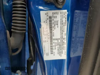 2018 Ford Focus SE z VIN 1FADP3F27JL260280, wystawiony jako Copart lot #54690975 z przebiegiem 73 322 mil mil oraz Szkoda całkowita • Salvage title. Historia ofert i sprzedaży dostępna na DreamBid. Obrazek 12.