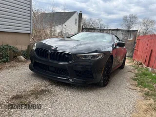 2023 BMW M8 Competition with VIN WBSDZ0C07PCK30073, listed as a Copart auction lot 49407825 with 999,999 mi miles and Salvage Title. Bid and sale history available at carsss.com. Image 1.