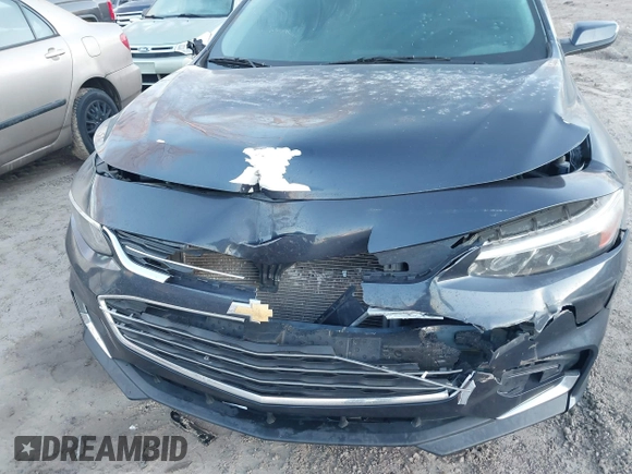 2016 Chevrolet Malibu LT with VIN 1G1ZE5ST0GF251789, listed as a IAAI auction lot 41431207 with 143,640 mi miles and . Bid and sale history available at DreamBid. Image 6.