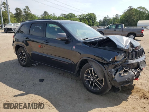 2019 Jeep Grand Cherokee Trailhawk with VIN 1C4RJFLG6KC838275, listed as a Copart auction lot 53002185 with 77,597 mi miles and Salvage title. Bid and sale history available at DreamBid. Image 4.