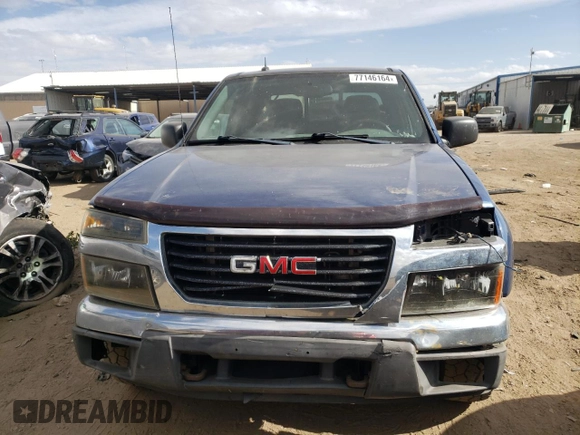 2006 GMC Canyon SLE2 with VIN 1GTDT136968311810, listed as a Copart auction lot 77146164 with 243,109 mi miles and Salvage Title. Bid and sale history available at carsss.com. Image 5.
