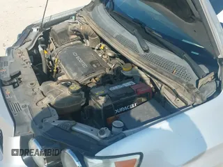 2014 Chevrolet Sonic LS z VIN 1G1JB5SH5E4121792, wystawiony jako IAAI lot #42955780 z przebiegiem 151 553 mil mil oraz . Historia ofert i sprzedaży dostępna na DreamBid. Obrazek 13.