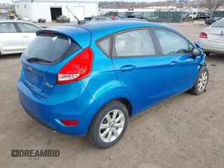 2013 Ford Fiesta SE with VIN 3FADP4EJ6DM130511, listed as a IAAI auction lot 41757636 with 153,664 mi miles. Bid and sale history available at carsss.com. Image 4.