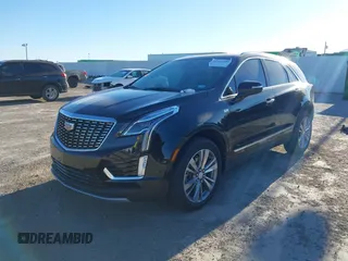 2024 Cadillac XT5 FWD Premium Luxury with VIN 1GYKNCRS4RZ729461, listed as a IAAI auction lot 41411300 with 5,760 mi miles. Bid and sale history available at carsss.com. Image 17.