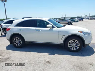 2014 Infiniti QX70 with VIN JN8CS1MU7EM451098, listed as a IAAI auction lot 42026803 with 126,605 mi miles and . Bid and sale history available at DreamBid. Image 13.