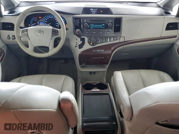 2011 Toyota Sienna XLE AAS with VIN 5TDYK3DC8BS024209, listed as a Copart auction lot 58923715 with 134,051 mi miles and Salvage title. Bid and sale history available at DreamBid. Image 8.