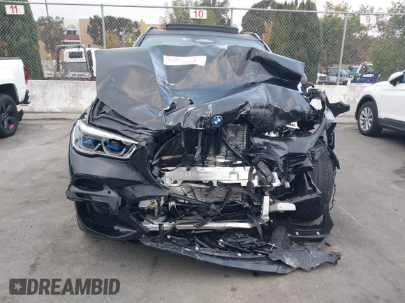 2023 BMW X5 xDrive45e z VIN 5UXTA6C02P9P59732, wystawiony jako IAAI lot #40713343 z przebiegiem Nie podano mil oraz . Historia ofert i sprzedaży dostępna na DreamBid. Obrazek 12.