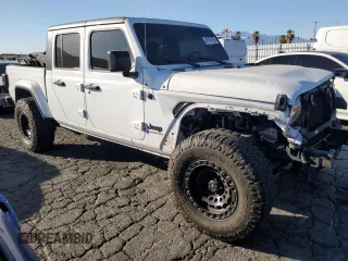 2022 Jeep Gladiator Willys with VIN 1C6HJTAG9NL143314, listed as a Copart auction lot 87974155 with 25,106 mi miles and Salvage title. Bid and sale history available at DreamBid. Image 4.