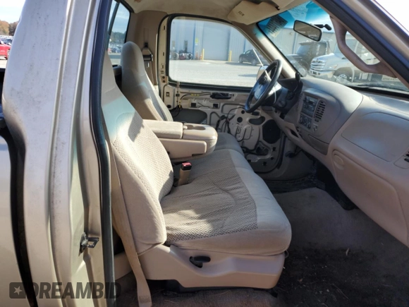 1999 Ford F-150 XL с VIN 1FTRF17L2XKA36749, выставлен на аукционе Copart как лот 84671444 с пробегом 148 338 миль миль и Списание • Salvage title. История ставок и продаж доступна на DreamBid. Изображение 10.