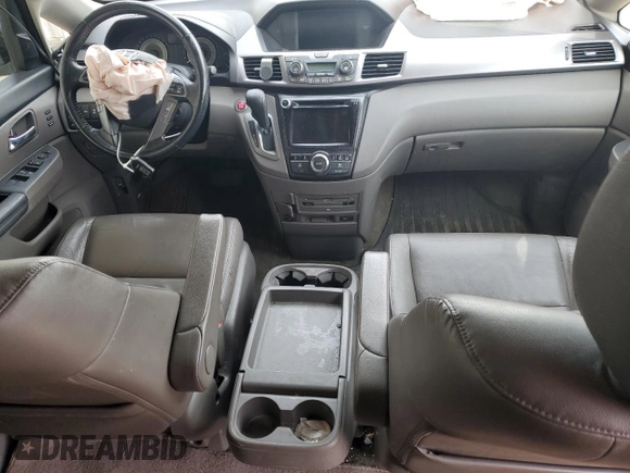 2014 Honda Odyssey Touring with VIN 5FNRL5H92EB109809, listed as a Copart auction lot 51438645 with 155,872 mi miles and Salvage Title. Bid and sale history available at DreamBid. Image 8.
