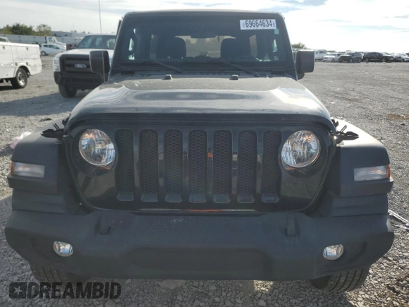2023 Jeep Wrangler Sport with VIN 1C4HJXDN7PW530536, listed as a Copart auction lot 69664634 with 16,816 mi miles and Salvage Title. Bid and sale history available at DreamBid. Image 5.