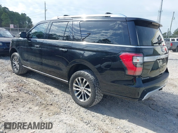 2019 Ford Expedition Max Platinum with VIN 1FMJK1MT1KEA78880, listed as a IAAI auction lot 41449348 with 76,390 mi miles and . Bid and sale history available at DreamBid. Image 3.