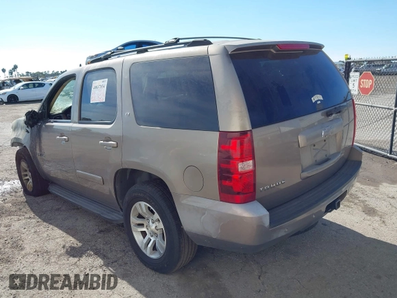 2007 Chevrolet Tahoe LS with VIN 1GNFC13J57R183484, listed as a IAAI auction lot 40837034 with Not provided miles and . Bid and sale history available at DreamBid. Image 3.