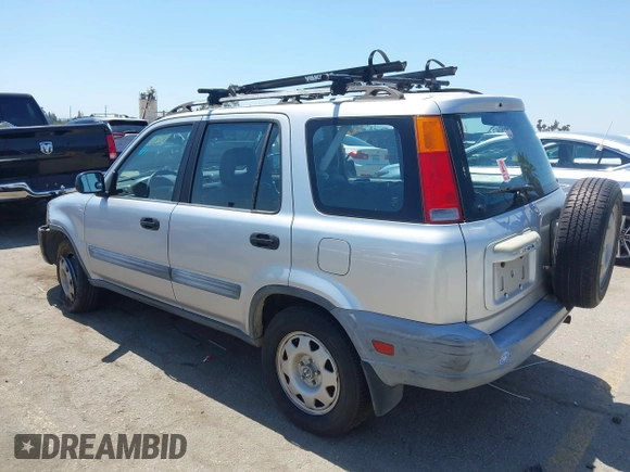 1999 Honda CR-V LX with VIN JHLRD2847XC000944, listed as a IAAI auction lot 42082593 with 198,474 mi miles. Bid and sale history available at carsss.com. Image 3.