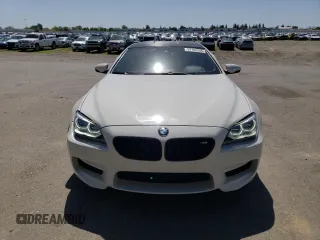 2015 BMW M6 z VIN WBS6C9C50FD467538, wystawiony jako Copart lot #52152245 z przebiegiem 65 483 mil mil oraz Czysty tytuł • Clean title. Historia ofert i sprzedaży dostępna na DreamBid. Obrazek 5.