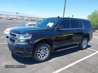 2015 Chevrolet Tahoe Commercial z VIN 1GNLC2EC0FR629983, wystawiony jako IAAI lot #42825604 z przebiegiem 112 410 mil mil oraz . Historia ofert i sprzedaży dostępna na DreamBid. Obrazek 14.