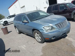 2005 Chrysler Pacifica Touring with VIN 2C4GM68475R330521, listed as a IAAI auction lot 40612905 with 128,406 mi miles and . Bid and sale history available at DreamBid. Image 1.