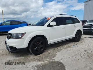 2018 Dodge Journey Crossroad with VIN 3C4PDDGG5JT387601, listed as a Copart auction lot 57275435 with 215,761 mi miles and Clean title. Bid and sale history available at DreamBid. Image 1.