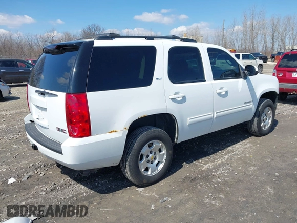 2009 GMC Yukon SLT w/4SA with VIN 1GKFK33059R282974, listed as a IAAI auction lot 42013219 with 209,240 mi miles. Bid and sale history available at carsss.com. Image 4.