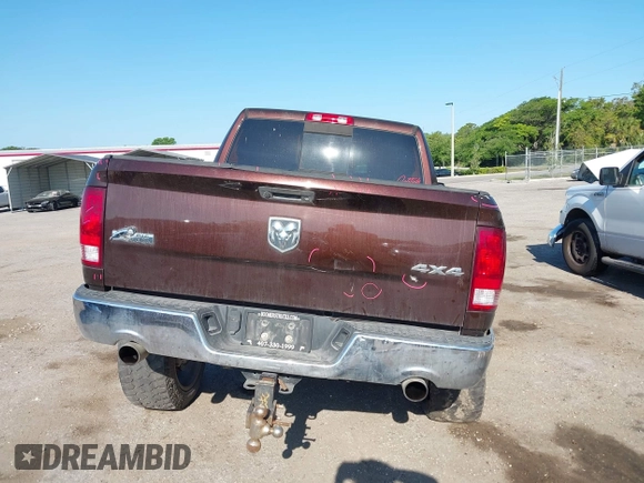 2015 Ram 1500 Big Horn with VIN 3C6RR7LT5FG597847, listed as a IAAI auction lot 42042971 with 212,541 mi miles and . Bid and sale history available at DreamBid. Image 16.