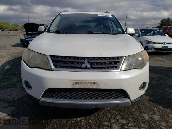2009 Mitsubishi Outlander SE z VIN JA4MT31W69Z001475, wystawiony jako Copart lot #74098814 z przebiegiem 142 351 mil mil oraz Szkoda całkowita • Salvage title. Historia ofert i sprzedaży dostępna na DreamBid. Obrazek 5.