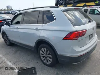 2018 Volkswagen Tiguan SEL with VIN 3VV2B7AX8JM105246, listed as a IAAI auction lot 41906838 with 110,749 mi miles and . Bid and sale history available at DreamBid. Image 3.