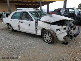 2003 Ford Crown Victoria LX with VIN 2FAFP74W03X158931, listed as a Copart auction lot 71588824 with 165,074 mi miles and Salvage Title. Bid and sale history available at carsss.com. Image 4.