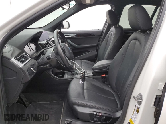 2021 BMW X1 xDrive28i with VIN WBXJG9C09M5U35093, listed as a Copart auction lot 65509155 with 46,875 mi miles and Salvage title. Bid and sale history available at DreamBid. Image 7.
