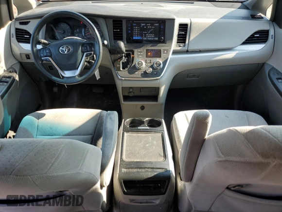 2015 Toyota Sienna LE AAS with VIN 5TDKK3DCXFS651621, listed as a Copart auction lot 66263885 with 150,578 mi miles and Salvage title. Bid and sale history available at DreamBid. Image 8.