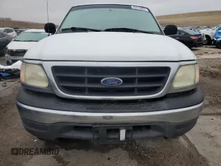 2000 Ford F-150 with VIN 1FTRF18W8YKA60791, listed as a Copart auction lot 45215895 with 157,885 mi miles and Clean title. Bid and sale history available at DreamBid. Image 5.