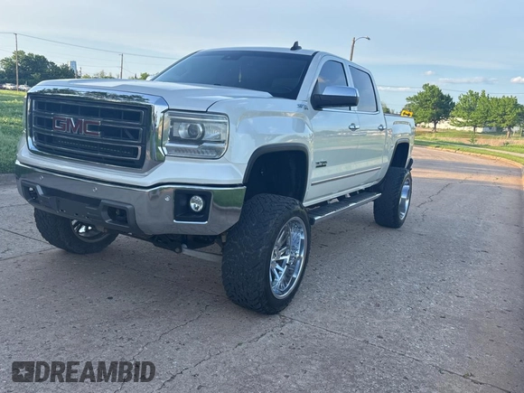 2015 GMC Sierra 1500 SLT with VIN 3GTU2VEC0FG239547, listed as a Copart auction lot 54957305 with 135,497 mi miles and Clean Title. Bid and sale history available at DreamBid. Image 2.
