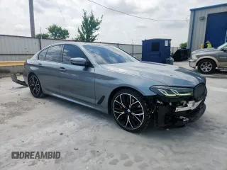 2022 BMW 5 Series 530i with VIN WBA53BH00NWX59634, listed as a Copart auction lot 61598505 with 69,130 mi miles and Salvage title. Bid and sale history available at DreamBid. Image 4.
