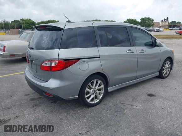 2013 Mazda 5 Touring with VIN JM1CW2CL5D0160104, listed as a IAAI auction lot 41722470 with 135,708 mi miles. Bid and sale history available at carsss.com. Image 4.