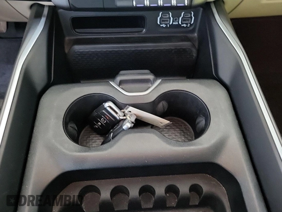 2022 Ram 1500 Big Horn with VIN 1C6RRFFG1NN179039, listed as a IAAI auction lot 42575822 with 69,264 mi miles and . Bid and sale history available at DreamBid. Image 2.