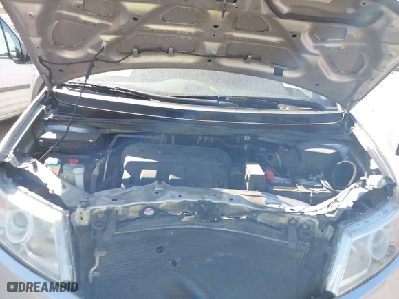 2013 Honda Odyssey EX-L with VIN 5FNRL5H65DB046726, listed as a IAAI auction lot 41763685 with 140,476 mi miles. Bid and sale history available at carsss.com. Image 10.
