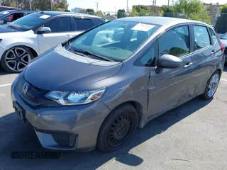 2015 Honda Fit LX with VIN 3HGGK5G54FM731965, listed as a IAAI auction lot 42655355 with 141,205 mi miles and . Bid and sale history available at DreamBid. Image 2.