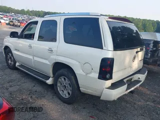 2002 Cadillac Escalade z VIN 1GYEK63N02R112364, wystawiony jako IAAI lot #42346753 z przebiegiem 216 891 mil mil oraz . Historia ofert i sprzedaży dostępna na DreamBid. Obrazek 3.